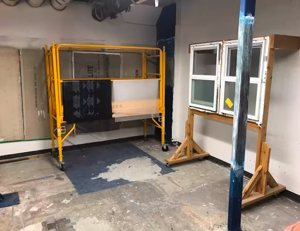 Commercial Movers Commercial renovation materials and windows prepared for transportation by specialized movers