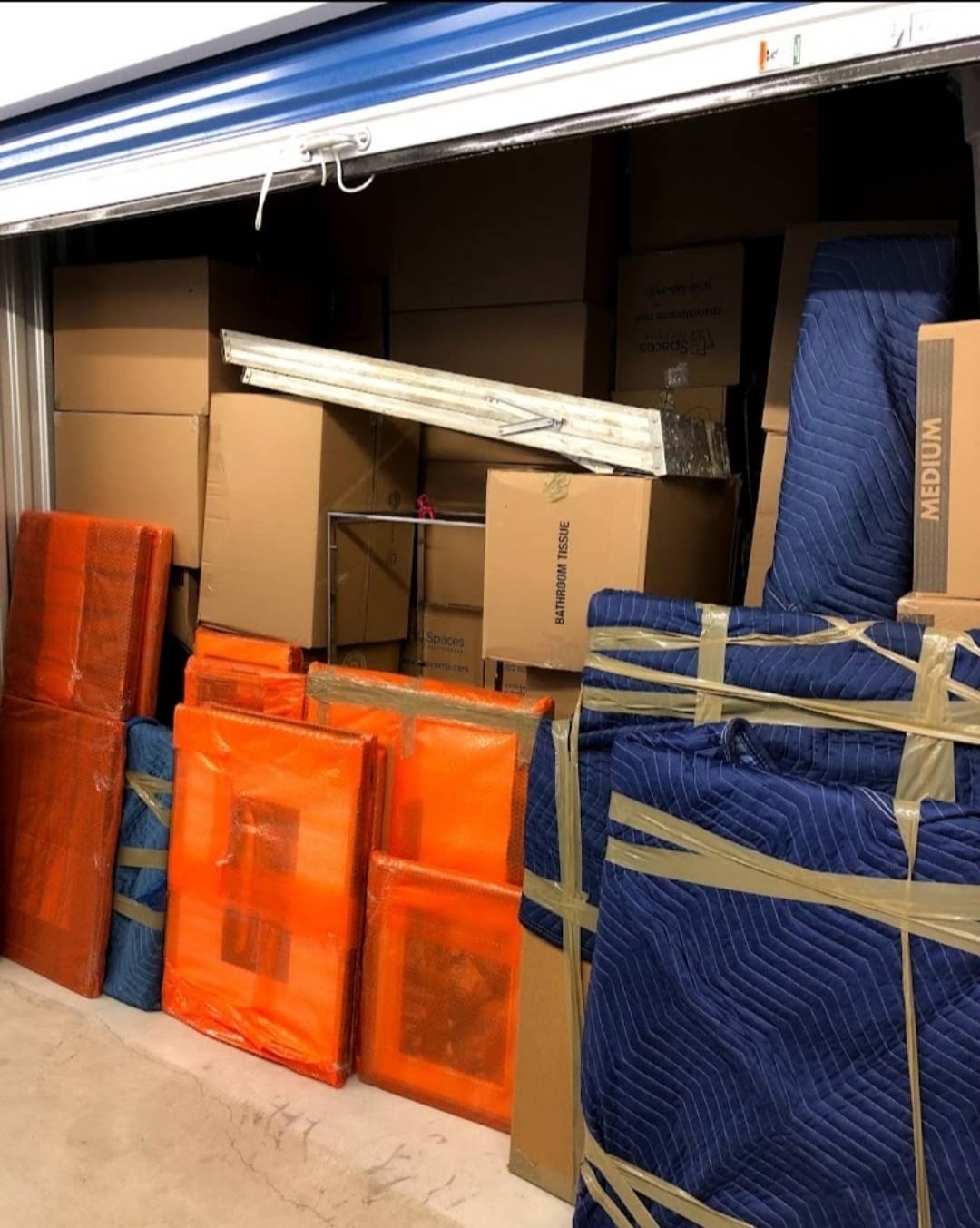 Storage unit filled with moving supplies